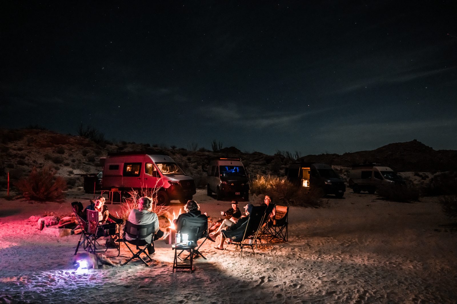 A lit camp holding its ground after dark