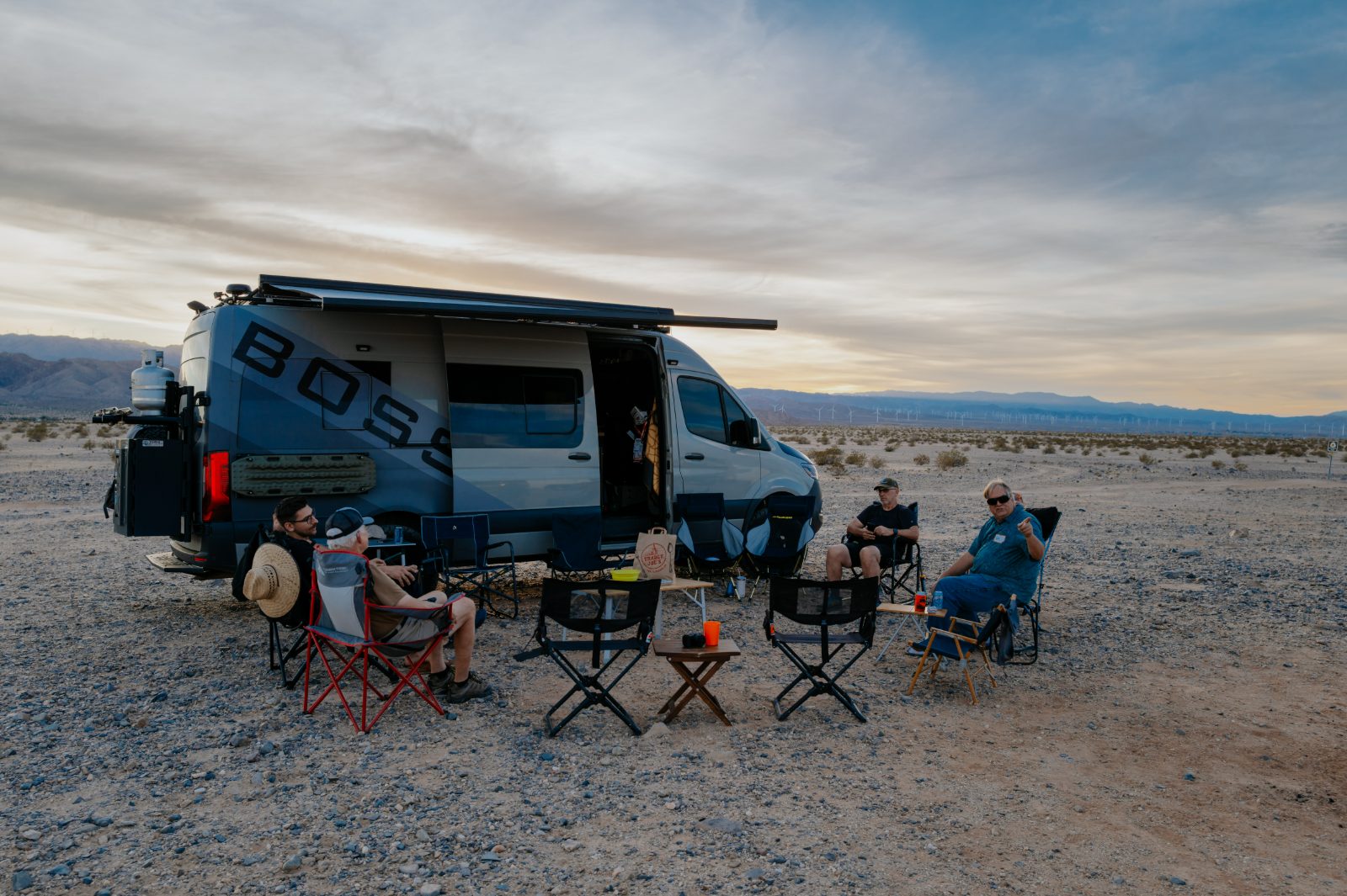A desert camp set against open ground
